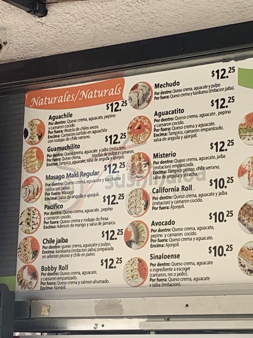 Printed menu page with sushi roll sections.